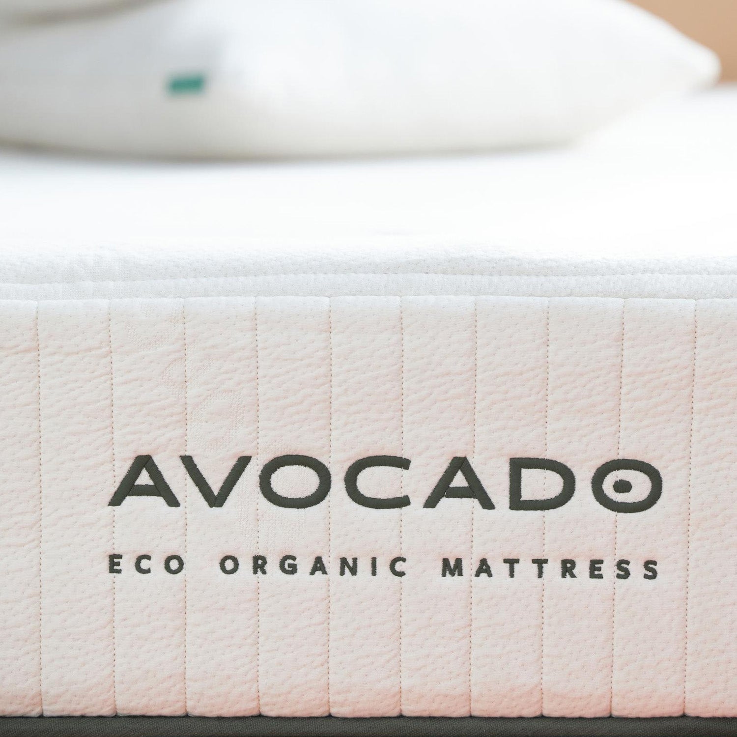 Avocado Eco Organic Mattress close up on mattress logo