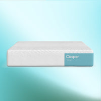 Casper Snow Hybrid Mattress against blue and white background front view