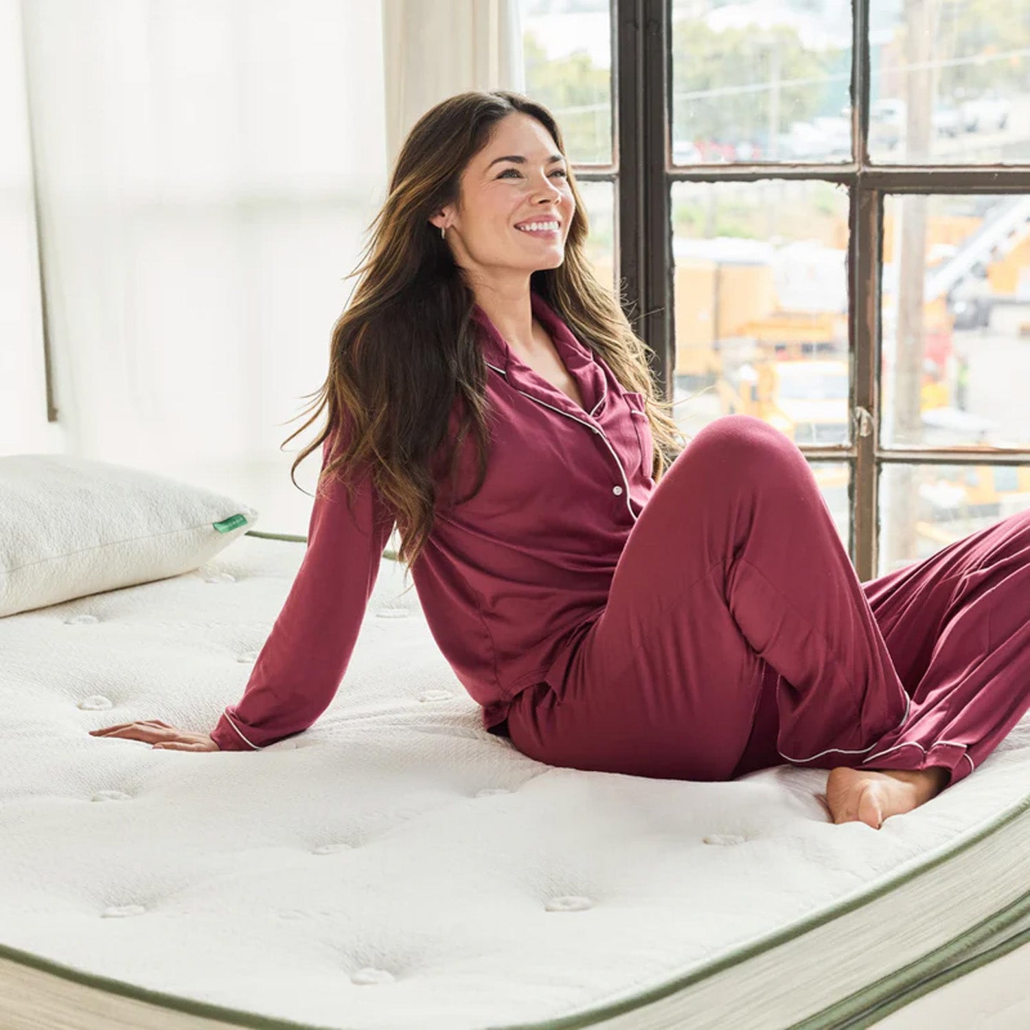 avocado green mattress plush with female model sitting